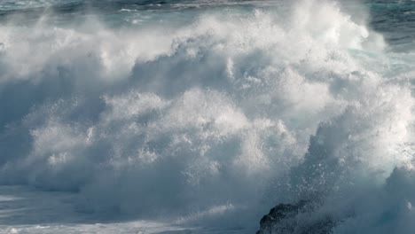 powerful atlantic waves crash against the rugged volcanic coastline near timanfaya national park in lanzarote, part of spain’s canary islands.