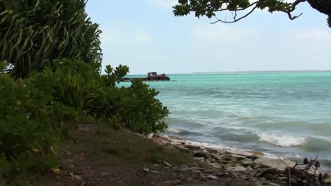 Rusty-remains-of-a-shipwreck-near-Fanning-Island,-Tabuaeran,-Republic-of-Kiribati