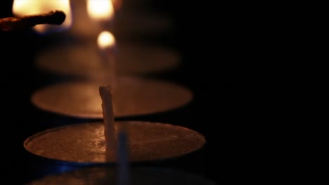 Lighting-up-candle-with-match-stick