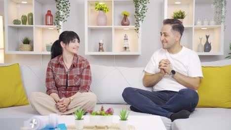 couple meditating together.