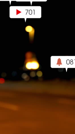 animación de iconos y números de redes sociales fuera de enfoque de la ciudad y los semáforos