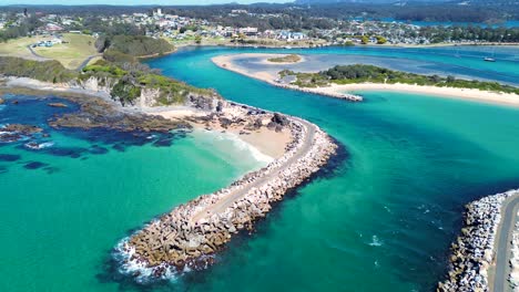 drone aerial inlet landscape coastline ocean channel wagonga beach narooma nsw south coast australia travel tourism boating 4k