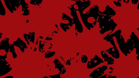 Animation-of-splashes-on-red-paint-on-black-background