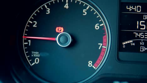 car interior dashboard details with indication lamps. car detailing. car instrument panel. dashboard closeup with visible speedometer and fuel level