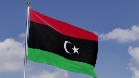 Flag-Of-Libya-Moving-In-The-Wind-With-A-Clear-Blue-Sky-In-The-Background,-Clouds-Slowly-Moving,-Flagpole,-Slow-Motion