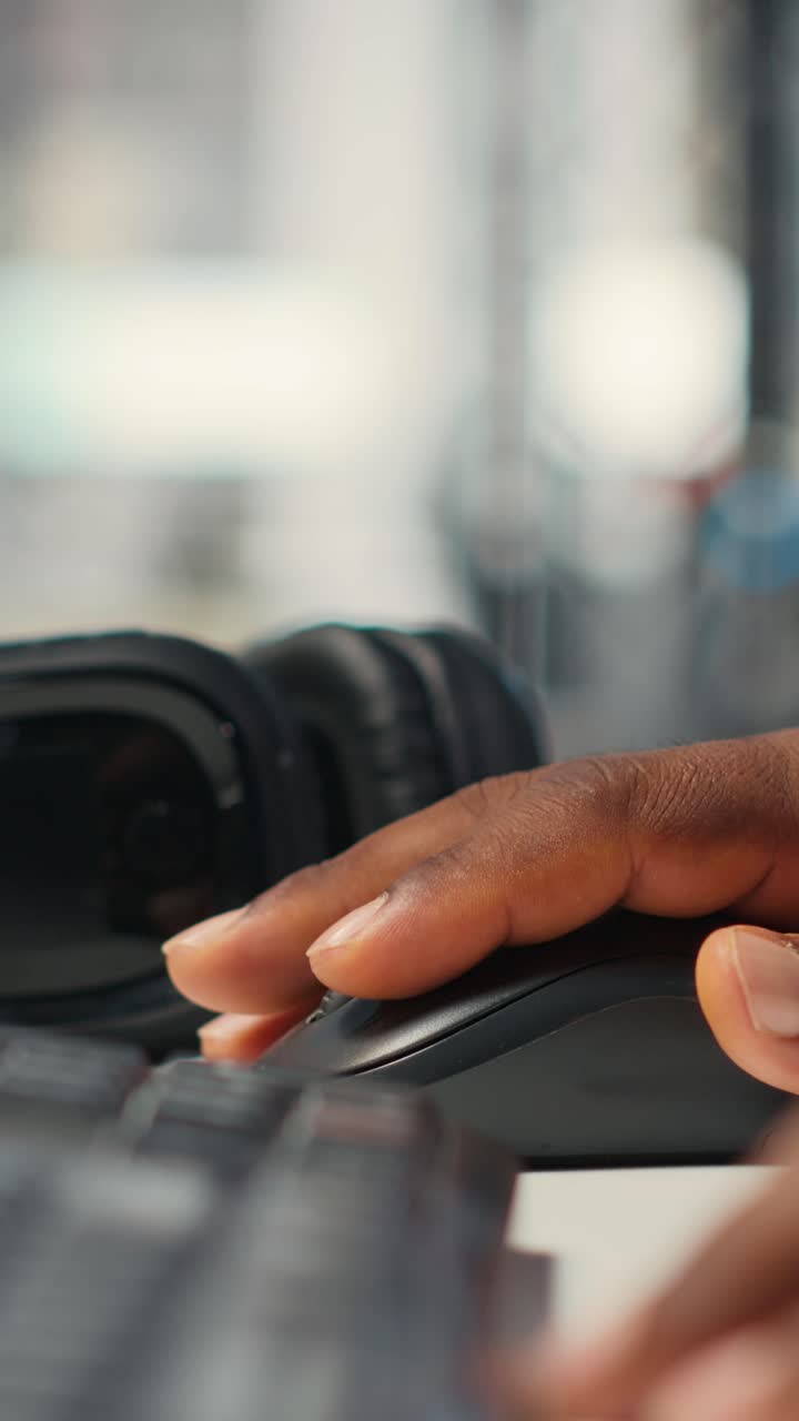 Vertical Video Close up of black employee leverages report writing for business development