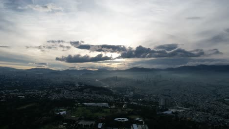 clouds dispersing over the city