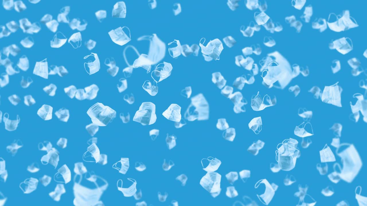 파란색 바탕에 많은 색 마스크를 날리는 의료 개념, 수술 보호 마스크, 마스크 회전의 3d 애니메이션, 루프 애니메이션.