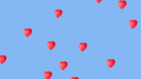 digital animation of multiple red heart shaped balloons floating against blue background