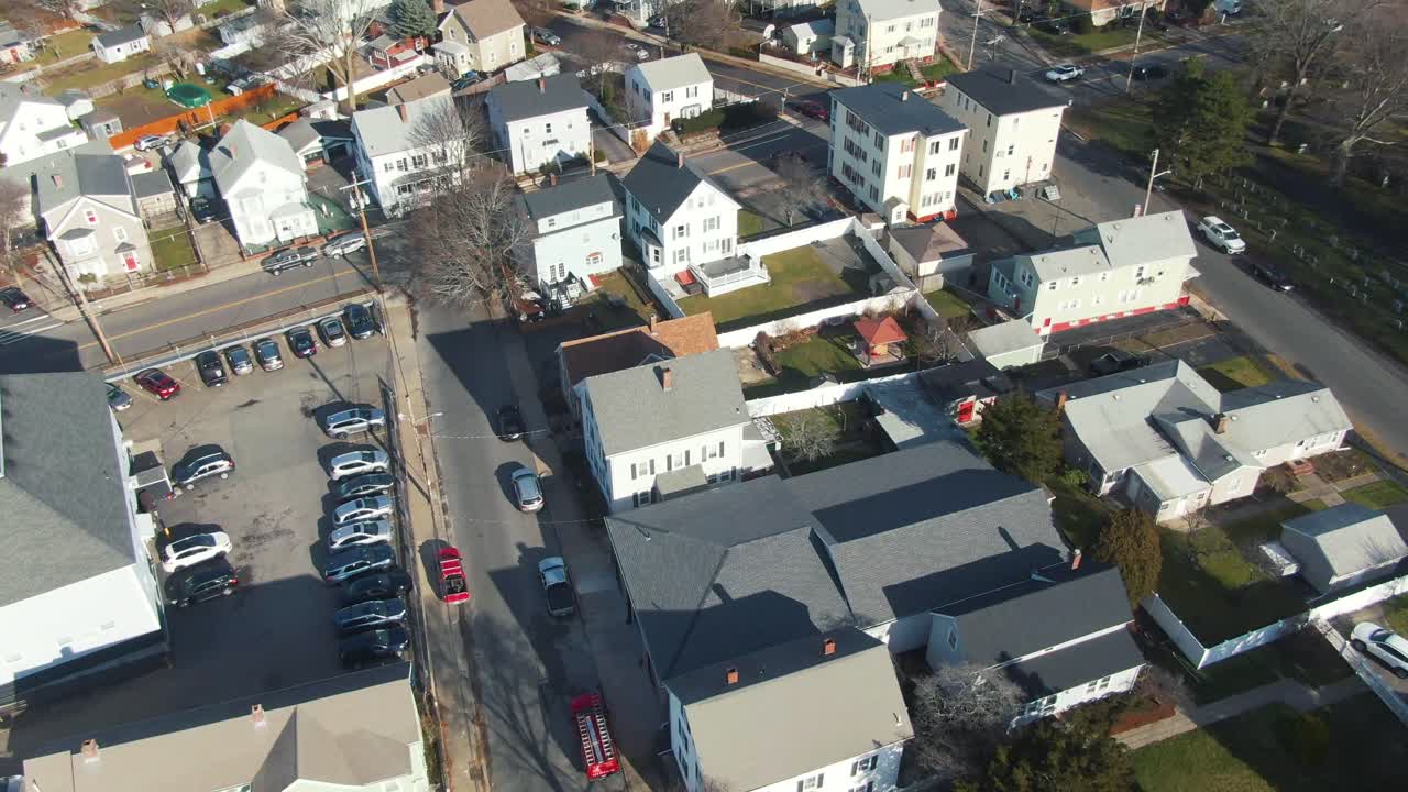Aerial of suburban neighborhood in Peabody, Massachusetts on partly cloudy day