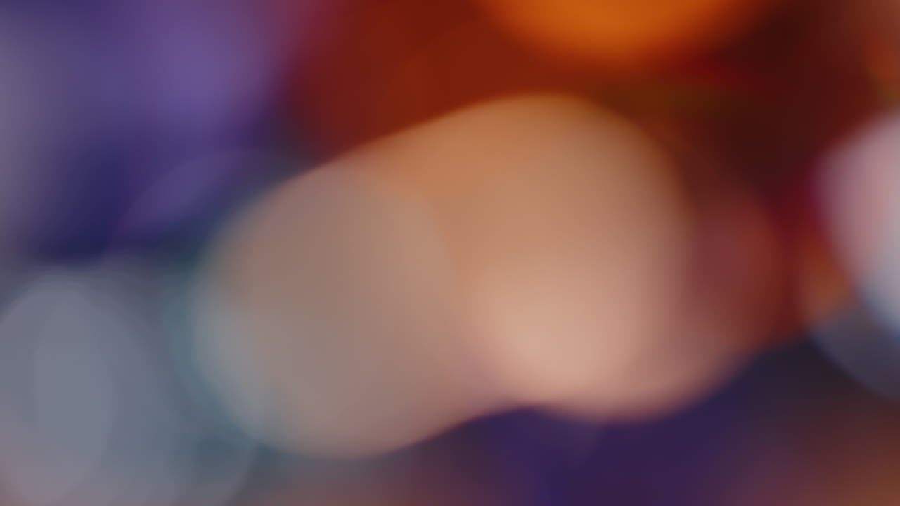 la luz multicolor filtra imágenes de 4k sobre fondo negro, vídeo estilizado, transiciones, efecto bokeh