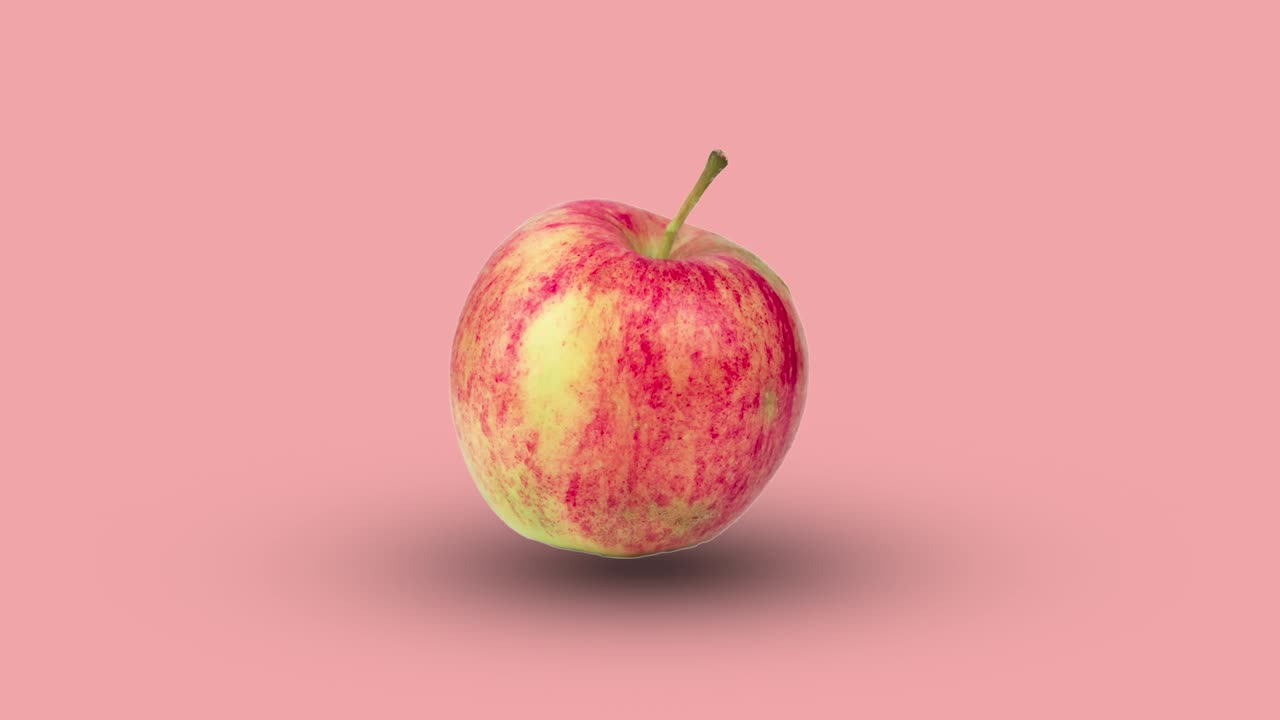 red fresh apple animated on a pink background. seamless looping of realistic 3d food. minimal motion design art with fruit