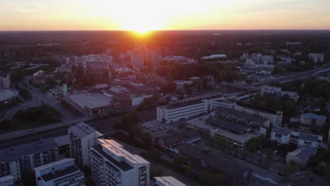 Cityscape-skyline-aerial-of-Kerava,-Finland-during-golden-sunrise