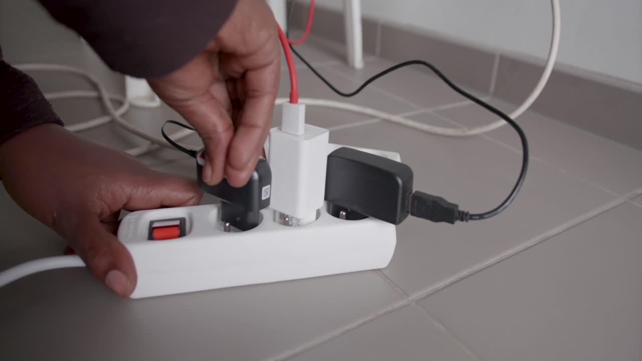 inserting plugs in a new energy saving unit with a energy saving switch