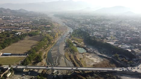 Transport-and-people-cross-the-main-bridge-of-Havelian-in-Pakistan-connecting-the-city-with-the-city-of-Abbottabad-in-the-Khyber-Pakhtunkhwa-Province