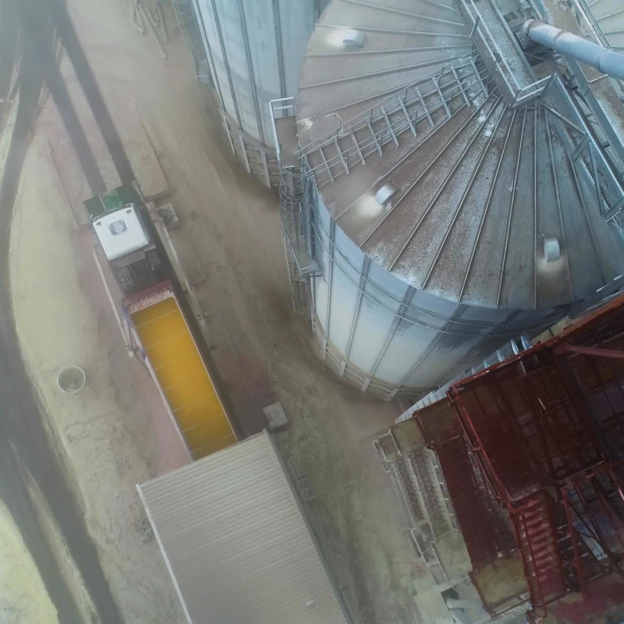 Modern metal storage elevator construction. Big agricultural elevator silos