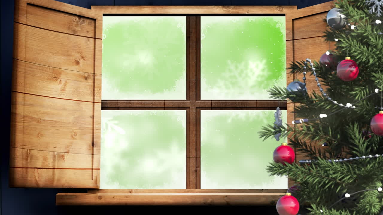 Christmas tree and wooden window frame against snowflakes falling on green background