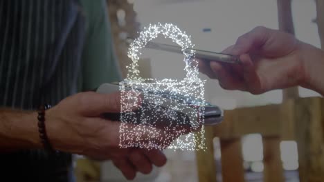 animation of network security padlock over people using payment terminal