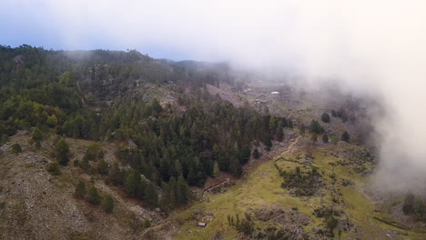 Aerial-shot-of-houses-on-the-rocky-mountains-of-Nebaj,-Quiche-in-Guatemala,-during-the-morning