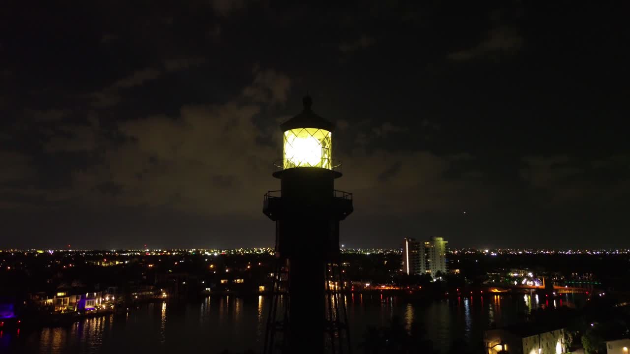A night shot of a lighthouse in South Florida