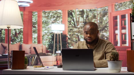 entrepreneur examining accounting data reports on a software at home