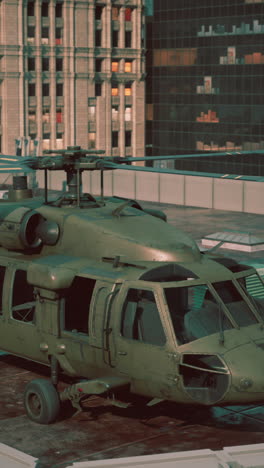 black hawk helicopter landing on a city rooftop