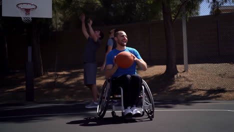 men playing wheelchair basketball on an outdoor court