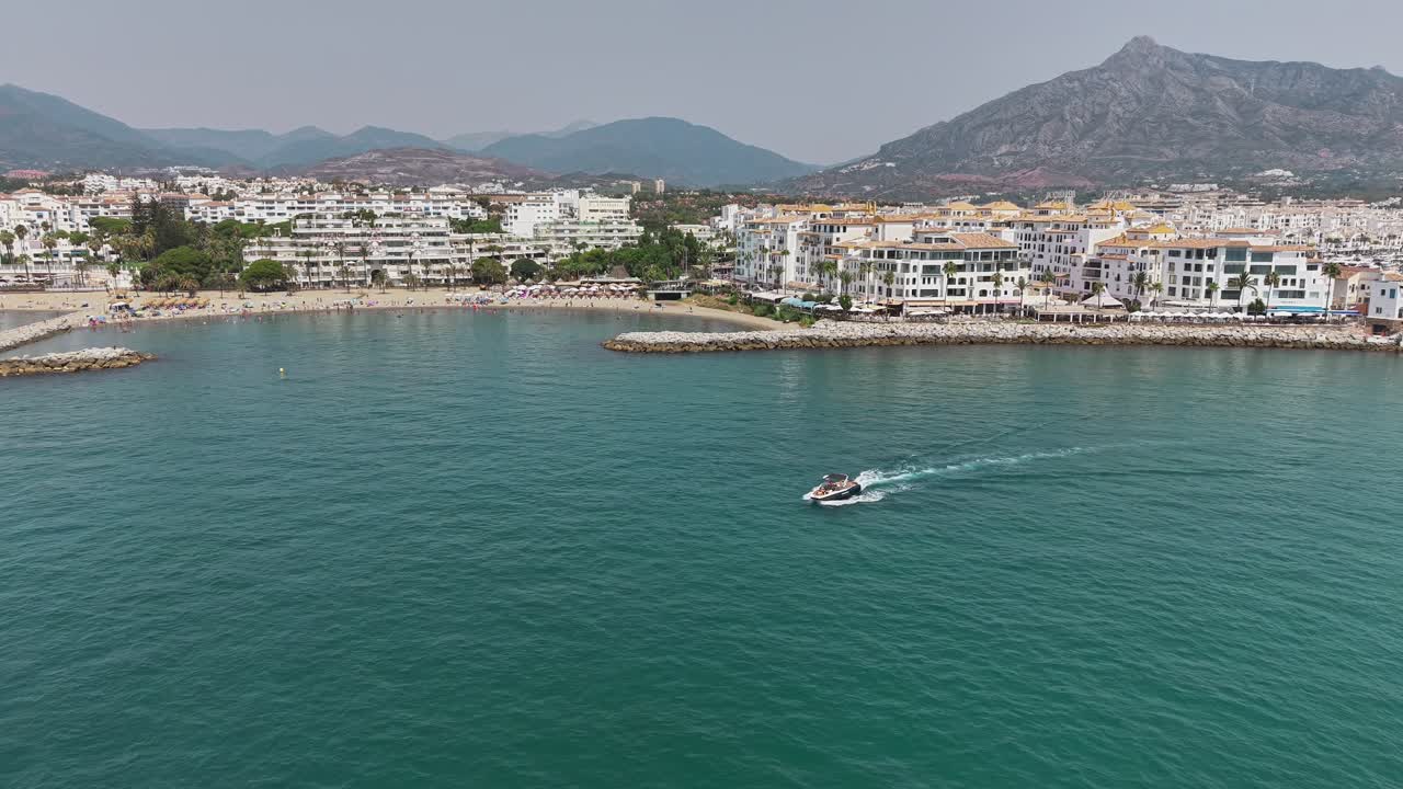 aerial view of Marbella bay with sandy beaches and luxury marina Spain