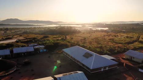 self sustainable african village with solar panels on top of the house