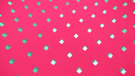 3D-Türkisfarbene-Quadrate-Auf-Rosa-Hintergrund
