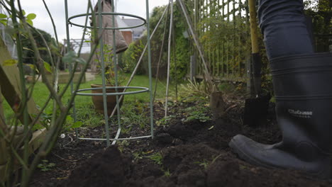 digging up soil in garden