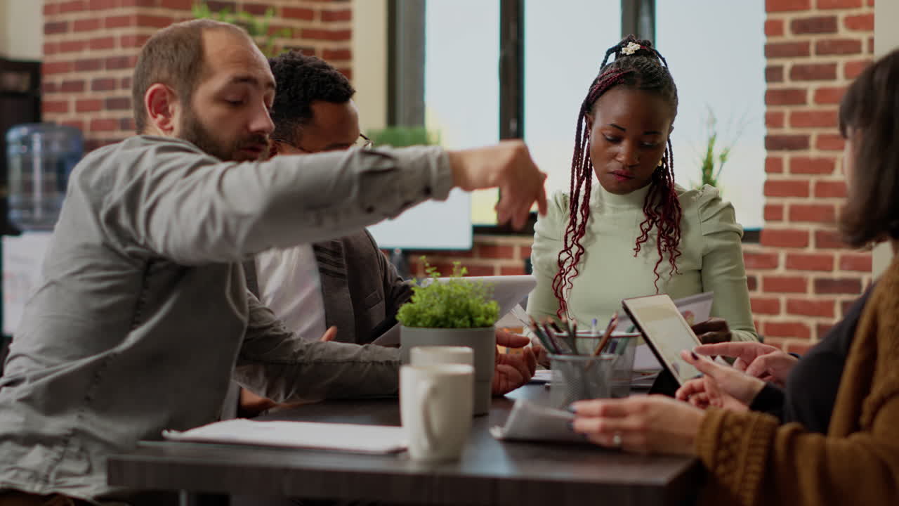 Business people doing teamwork to create successful presentation