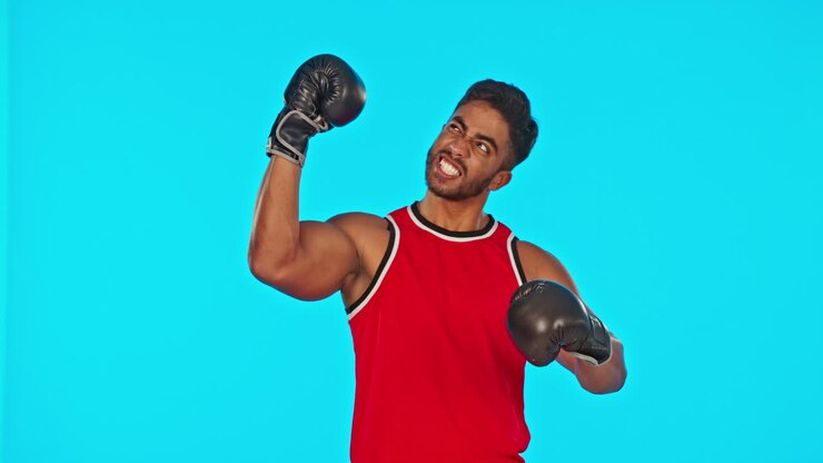 Face, boxer and man challenge in studio isolated