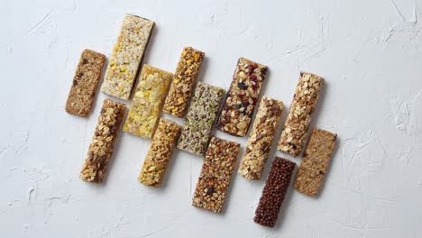 Row-of-mixed-gluten-free-granola-cereal-energy-bars--With-dried-fruits-and-nuts-