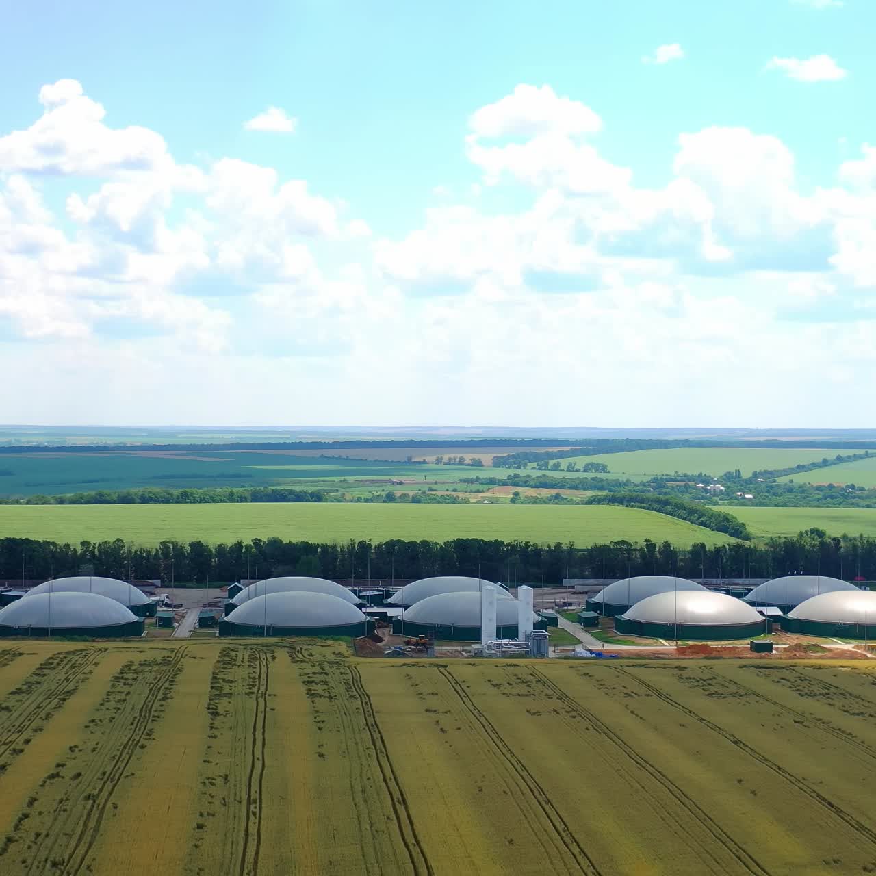 Tanks in biogas plant. Aerial view of biogas plant and storage tanks