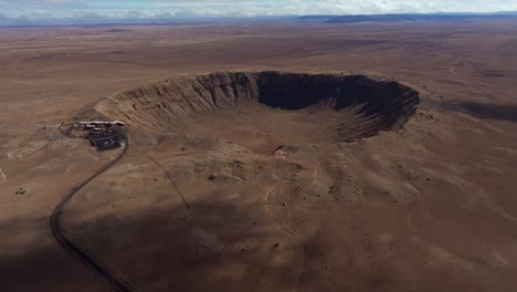 4k aerial of meteor crater or barringer crater in arizona, usa