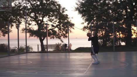 Handhelded-Footage-Of-Young-Girl-In-Shorts-And-White-Golf-Socks-Make-A-Shot-To-The-Basketball-Net-1