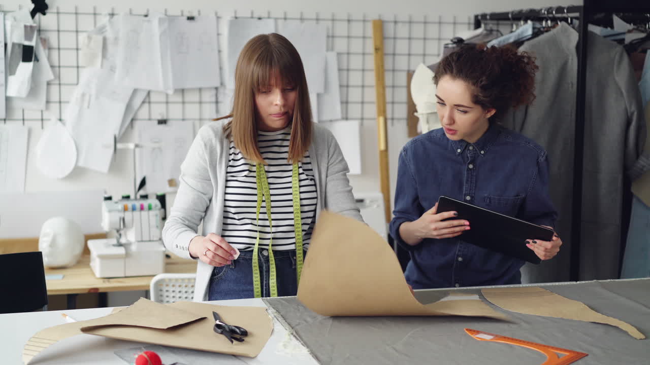 Fashion Designers Working on Patterns