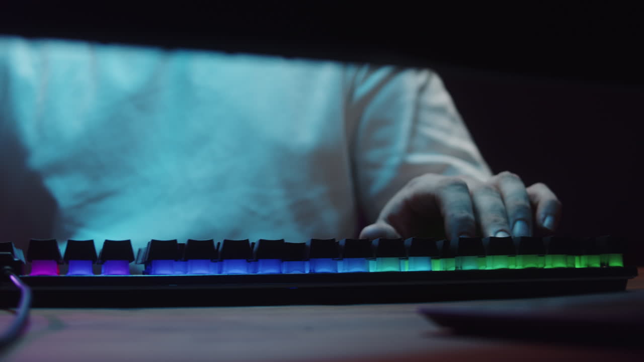 Gamer's Hand Operating Mouse and Keyboard with RGB Lights