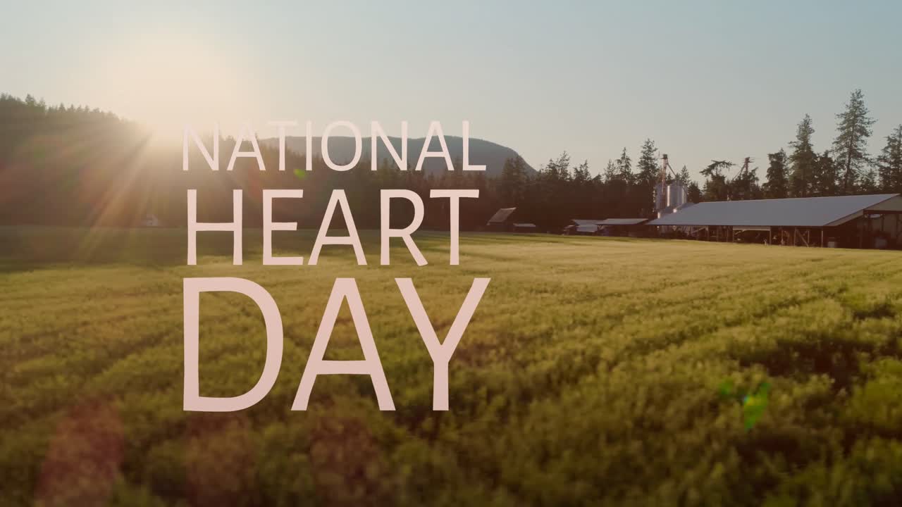 Animation of national heart day text over landscape