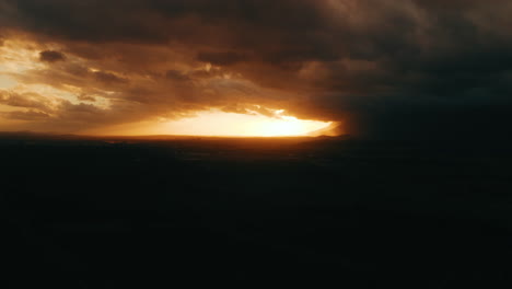 dramatic sunset through storm clouds