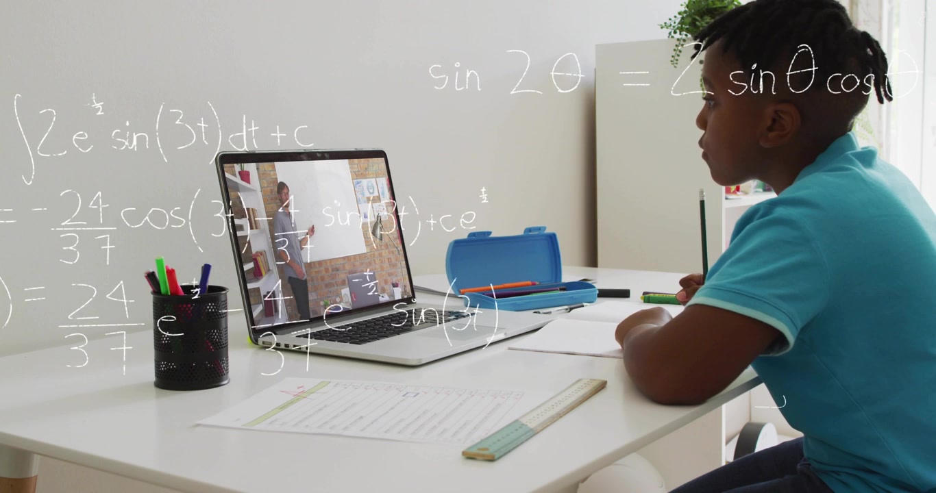 Student writing worksheet while laptop tutor gesturing, math overlays appearing guiding learning