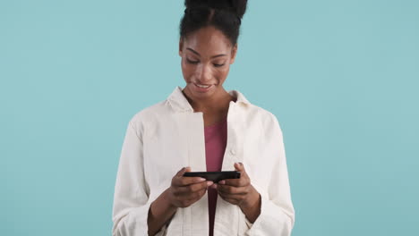 african american woman having good time watching video