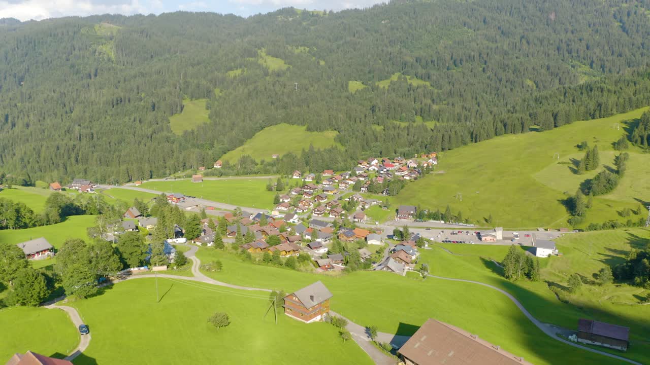 Aerial Push In Above Alpine Village in Europe on Amazing Summer Day