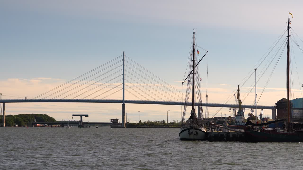 historic ship at harbour with rügen bridge in background sunny day
