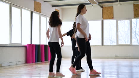 teacher and pupils in dance class