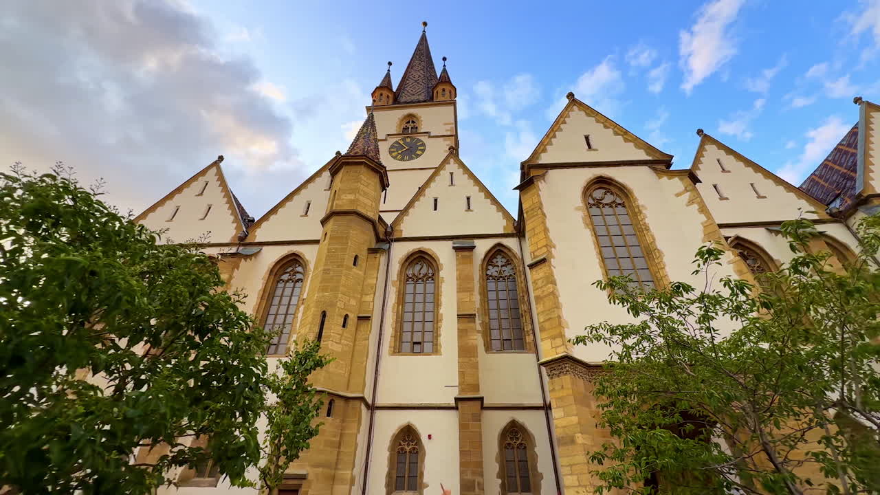 Lutheran Cathedral in Sibiu. The tall clock tower and gothic architecture of the Lutheran Cathedral in Sibiu