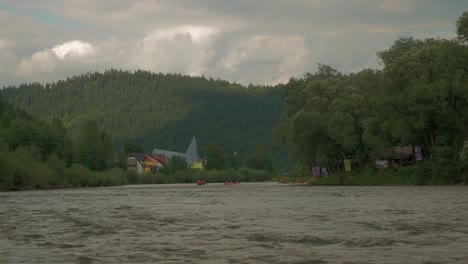 view from inside the raft on the river of dunajec in pieniny mountains in the south of poland. calm rafting.