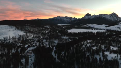 panorama of winter landscape with forest and sawtooth snowcapped mountains in stanley, idaho