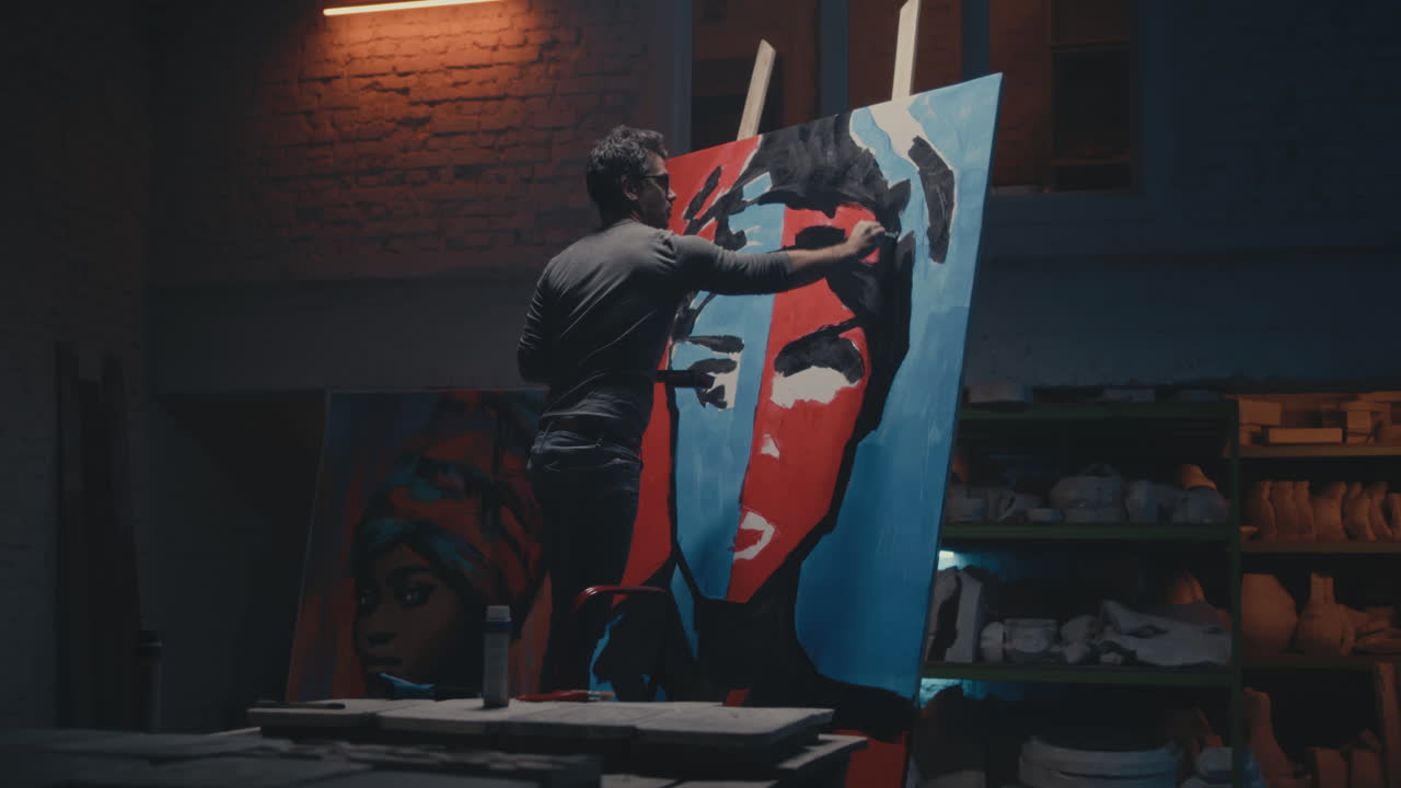 Artist Painting Abstract Portrait in Studio